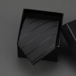 Classic black striped necktie packed in a delicate gift box, ideal for formal business wear.