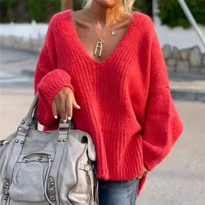 Casual oversized V-neck ribbed knit sweater for women, comfortable solid color pullover top.