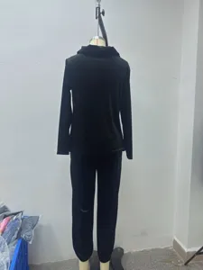 Back view detail of the casual black velvet long sleeve lounge set, soft fabric texture.