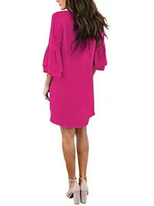 Back view of solid hot pink V-neck bell sleeve loose dress showing fabric drape and cut details.