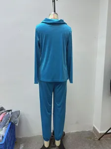 Blue velvet long sleeve casual lounge set detail view, comfortable loose two-piece outfit.