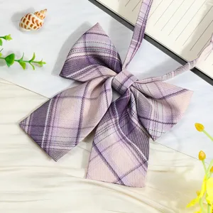 JK purple plaid bow tie detail shot, school uniform ribbon shirt accessory, cute style.