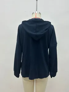 Waffle knit long sleeve hoodie for women, casual loose hooded sweatshirt in solid color.