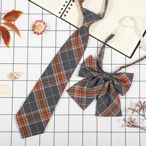 Set cravatta e papillon a quadri grigio e arancione stile scolastico giapponese cosplay.