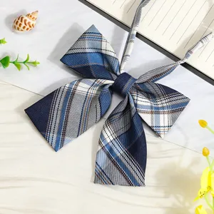 Detail view of the Japanese JK navy blue plaid bow tie ribbon, perfect uniform accessory.