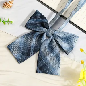 Blue plaid JK style bow tie detail view, Japanese school uniform accessory ribbon close up