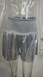 Metallic silver shiny shorts for women, casual elastic high waist drape design piece.