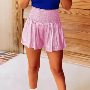 Casual loose elastic high waist shiny shorts for women, comfortable summer drape beach wear.