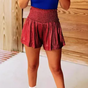 Discover trendy metallic shorts for women featuring high waist elastic smocked design and loose fit.