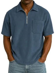 Men's solid color corduroy short sleeve zip polo shirt casual top with front pocket design.