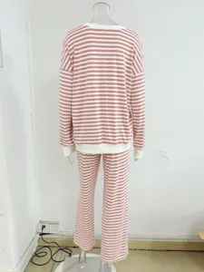 Pink white striped loungewear pajama set detail, long sleeve top and straight pants.