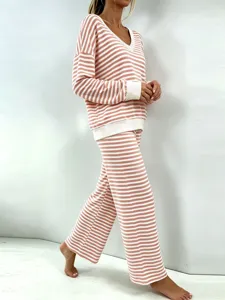 Detailed side view showcasing the pink striped V-neck long sleeve lounge top and pants set.
