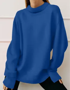 Close-up view of a stylish royal blue turtleneck sweatshirt with cozy long sleeves and relaxed fit.