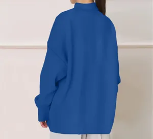 Back view detail shot of casual solid color long sleeve turtleneck sweatshirt in blue.