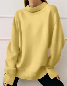 Close-up detail of soft yellow turtleneck long-sleeve loose sweatshirt for autumn daily wear.