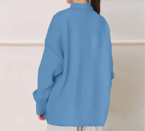 Back view detail of casual solid blue loose long sleeve sweatshirt, soft fabric garment.