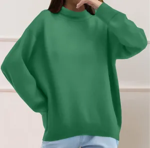 Close-up view of the green solid sweatshirt featuring cozy high collar and soft fabric.