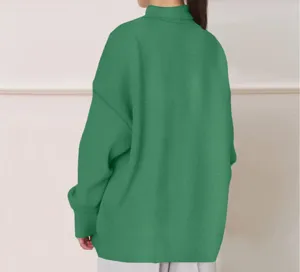 Back view detail of a casual green long sleeve mock neck oversized sweatshirt for women.
