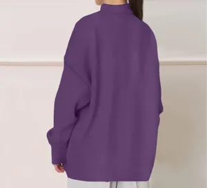 Details view of solid purple long sleeve mock neck oversized sweatshirt for women autumn wear.