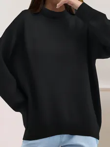 Detail view of a stylish solid black long sleeve mock neck sweatshirt for casual wear.