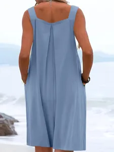 Light blue sleeveless jumpsuit detail showing the loose wide-leg back design for summer.