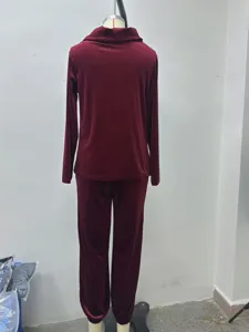 Wine red velvet loungewear set with a stylish cowl neck and long sleeves for cozy casual wear.