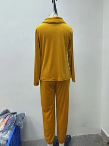 Detail view of women cowl neck velvet long sleeve casual loungewear set in mustard yellow color.