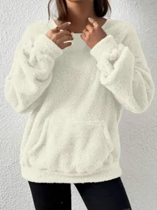 Cozy fluffy sherpa pullover sweatshirt for women, casual long sleeve winter top with pocket.
