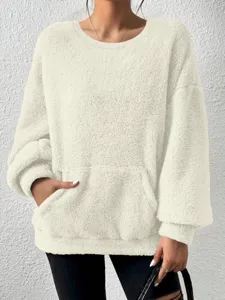 Cozy plush fleece material detail showing soft texture and front pocket of the casual sweatshirt.