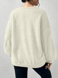 Detail view of a cozy solid color long sleeve fleece sweatshirt, casual autumn winter wear.