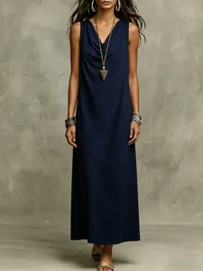 Detailed shot of a navy blue sleeveless loose cowl neck maxi dress, perfect for summer.