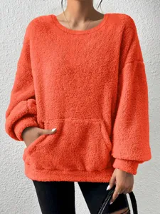 Casual solid color fuzzy long sleeve sweatshirt for women, cozy fleece pullover with pocket.