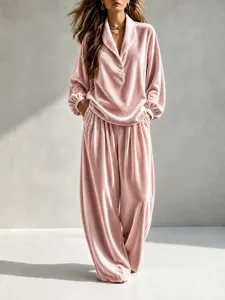 Detailed view of women casual pink velvet long sleeve lapel top and wide-leg trousers set.
