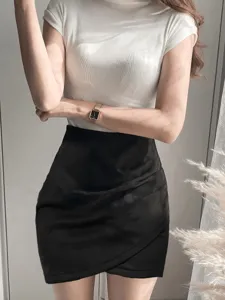 Details of the solid color faux suede wrap mini skirt with trendy irregular draped design.
