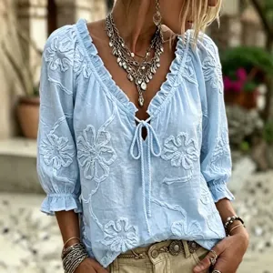 Light blue embroidered v-neck women blouse with tie string and 3/4 sleeves casual top.