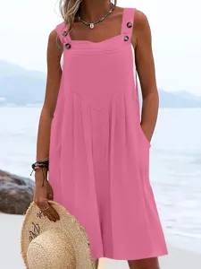 Sleeveless solid color jumpsuit detail view, featuring comfortable wide leg and button straps.