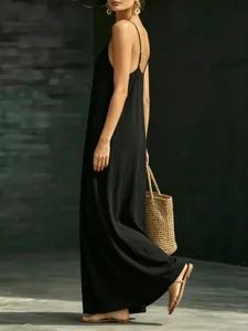 Summer casual black maxi dress, elegant V-neck spaghetti strap design for daily wear.