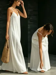 Detail shot of a solid white V-neck spaghetti strap maxi dress, casual fashion summer style.