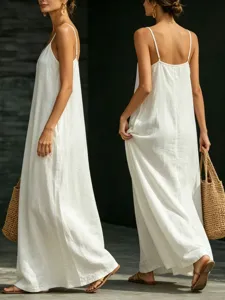 Detail view of a solid white maxi slip dress, featuring a V-neck and casual swing hemline.
