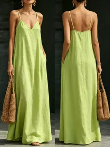 Detailed view of the lime green V-neck maxi dress, spaghetti straps and loose fit style.