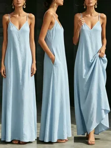Detailed view of the light blue v-neck cami maxi dress featuring side pockets and loose drape.