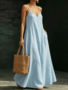Summer casual solid color V-neck spaghetti strap maxi dress with elegant large hem design.