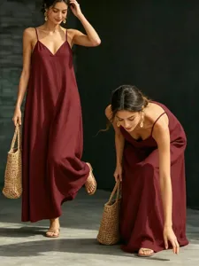 Detail view of a women's summer V-neck slip maxi dress, solid burgundy casual long dress.