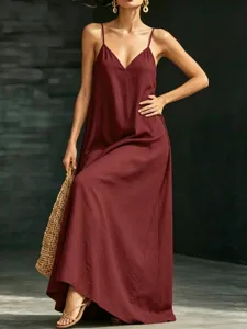 Wine red v-neck camisole maxi dress detail, elegant sleeveless summer flowing design.