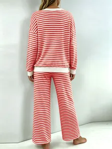Back view detail of the women red and white striped loungewear set featuring long sleeves.