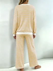 Women striped loungewear set, long sleeve top and straight pants for cozy home wear.