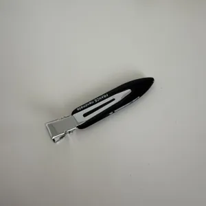 Simple black hair clip with silver metal clip head for women daily styling and fashion hair access.