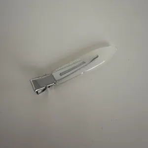 Minimalist acetate duckbill hair clip for women, sleek thin design for daily styling and bangs.