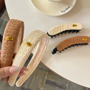Woven headband and banana hair clip set with elegant gold metal detail stylish chic hair accessories