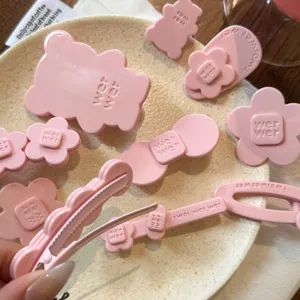 Pink cute hair clips set featuring floral and bear designs, exquisite acetate side hairpins.